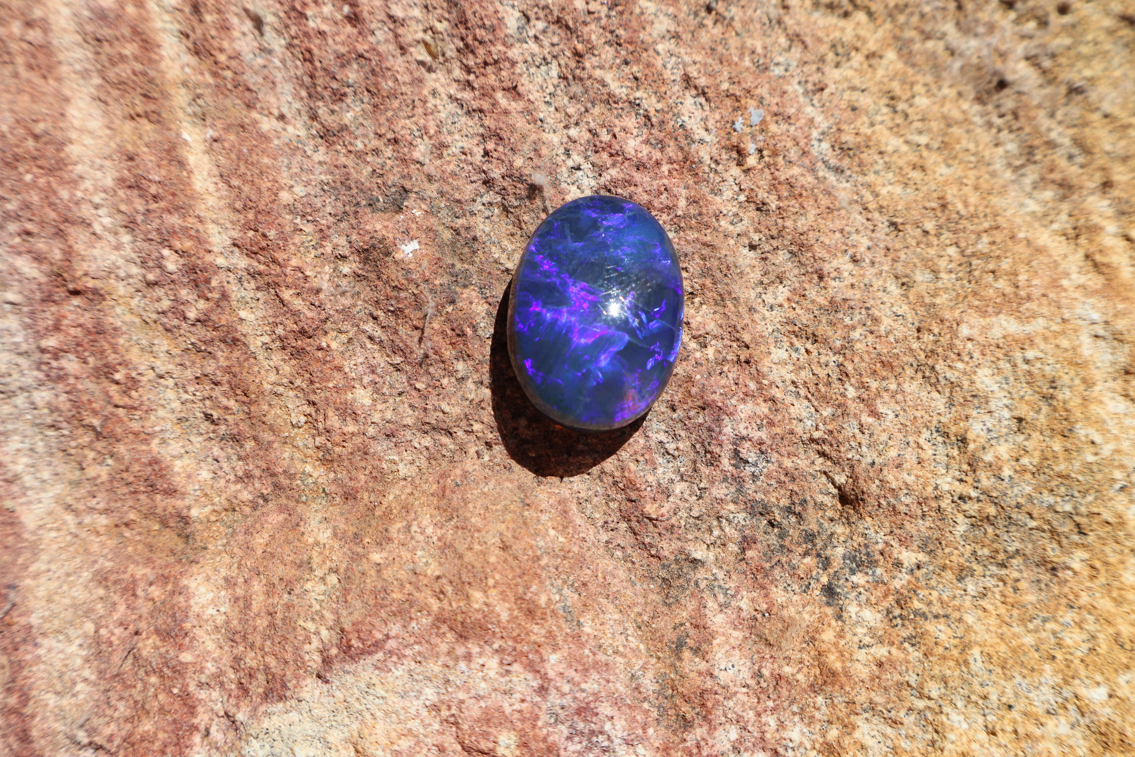 17.65ct Lightning Ridge Black Opal - Bright Purple & Aqua Flash. High dome. 22 x 16 x 8