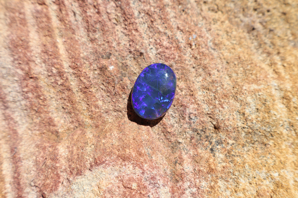 17.65ct Lightning Ridge Black Opal - Bright Purple & Aqua Flash. High dome. 22 x 16 x 8