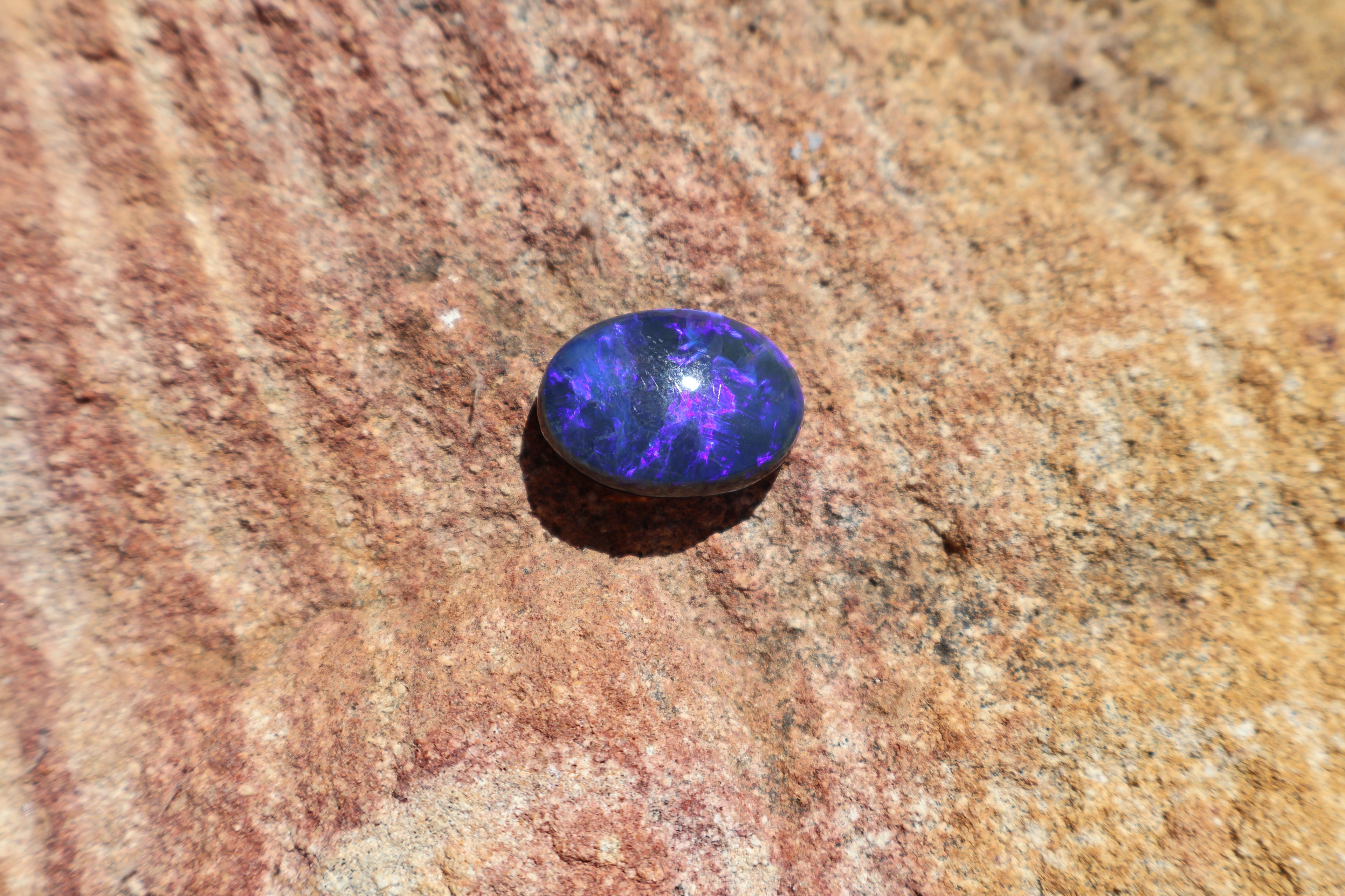 17.65ct Lightning Ridge Black Opal - Bright Purple & Aqua Flash. High dome. 22 x 16 x 8