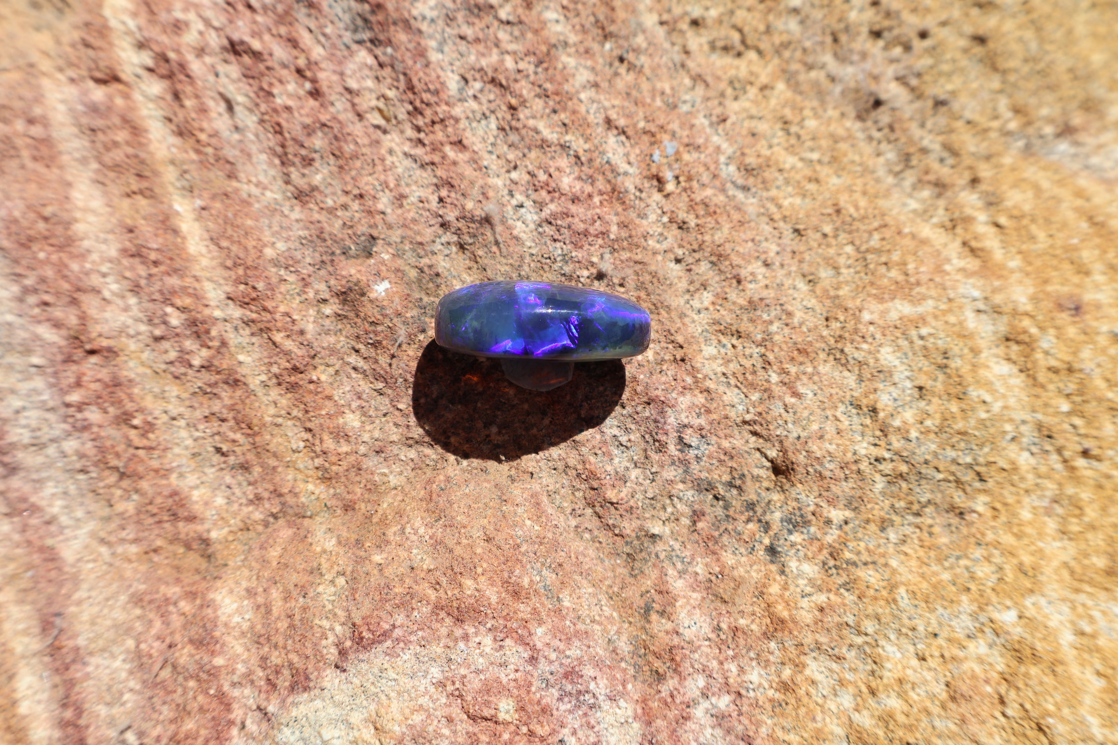 17.65ct Lightning Ridge Black Opal - Bright Purple & Aqua Flash. High dome. 22 x 16 x 8